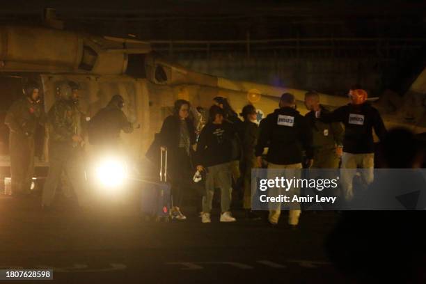 Families of the hostages arrive, ahead of the expected arrival of hostages who were released today by Hamas, at the Sheba Medical Center in Ramat...