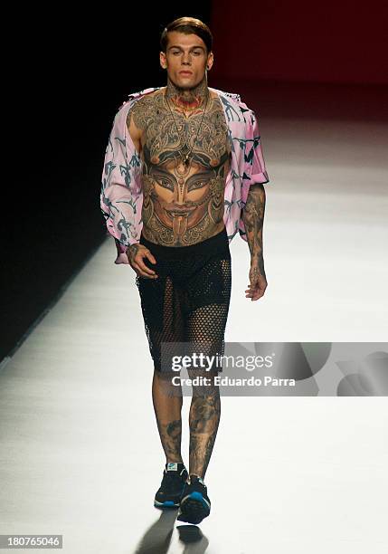 Model showcases designs by Maria Escote on the runway at Maria Escote show during Mercedes Benz Fashion Week Madrid Spring/Summer 2014 at Ifema on...