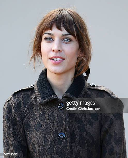 Alexa Chung attends the Burberry Prorsum show at London Fashion Week SS14 at on September 16, 2013 in London, England.