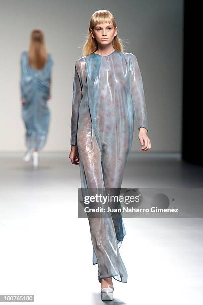 Model showcases designs by Martin Lamothe on the runway at Martin Lamothe show during Mercedes Benz Fashion Week Madrid Spring/Summer 2014 at Ifema...