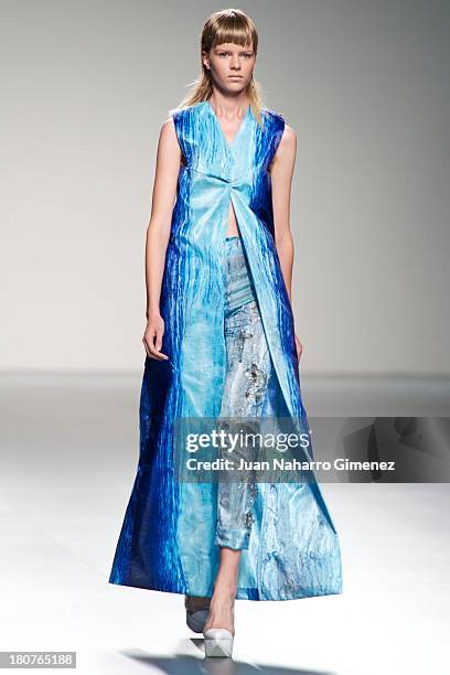 Model showcases designs by Martin Lamothe on the runway at Martin Lamothe show during Mercedes Benz Fashion Week Madrid Spring/Summer 2014 at Ifema...