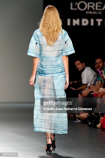 Model showcases designs by Martin Lamothe on the runway at Martin Lamothe show during Mercedes Benz Fashion Week Madrid Spring/Summer 2014 at Ifema...