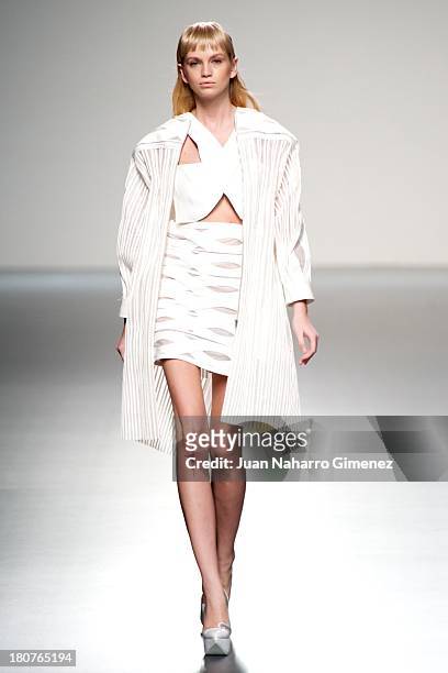 Model showcases designs by Martin Lamothe on the runway at Martin Lamothe show during Mercedes Benz Fashion Week Madrid Spring/Summer 2014 at Ifema...