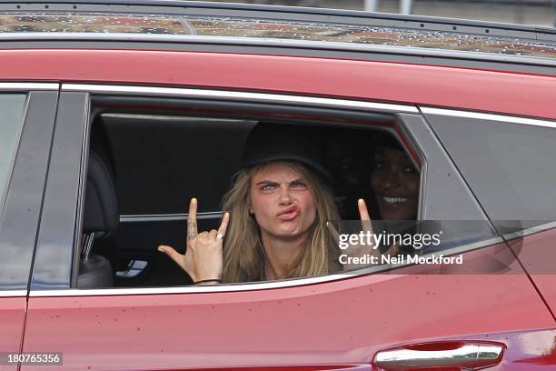 Cara Delevingne seen at the Burberry Prorsum on September 16, 2013 in London, England.