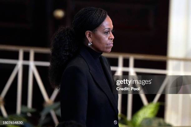 Former first lady Michelle Obama arrives for a memorial service for former first lady Rosalynn Carter at Glenn Memorial United Methodist Church at...