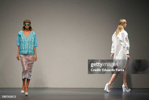 Models showcase designs by Martin Lamothe on the runway at Martin Lamothe show during Mercedes Benz Fashion Week Madrid Spring/Summer 2014 at Ifema...