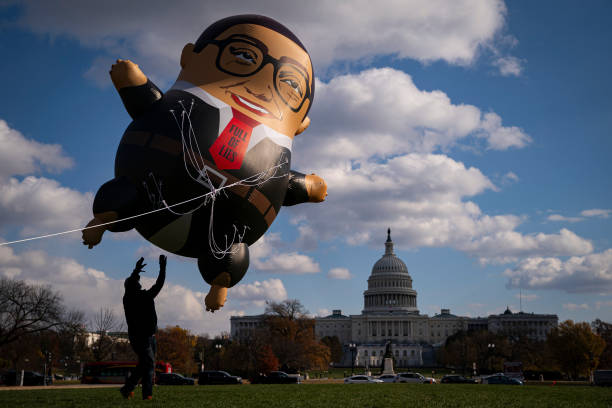 DC: MoveOn Political Action Displays Inflatable George Santos