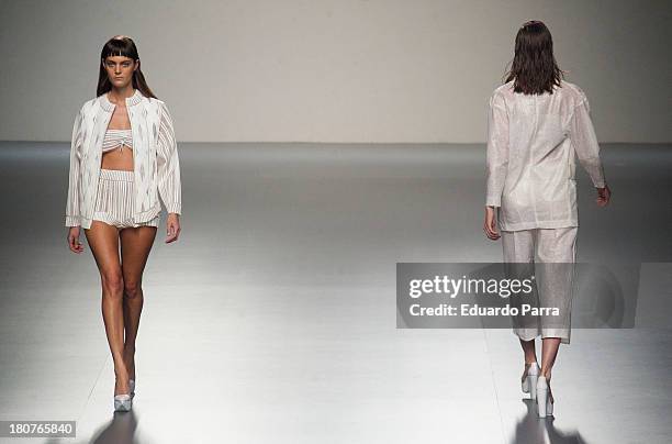 Models showcase designs by Martin Lamothe on the runway at Martin Lamothe show during Mercedes Benz Fashion Week Madrid Spring/Summer 2014 at Ifema...