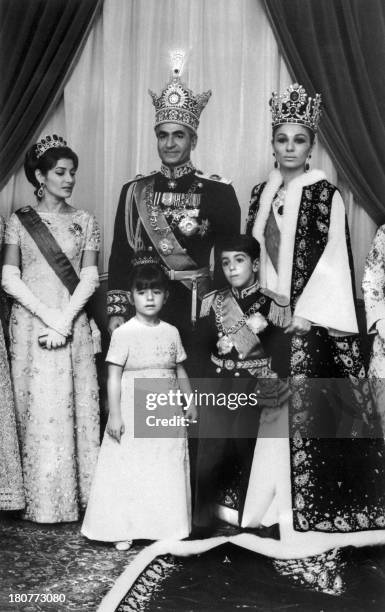 Family picture shot 26 October 1967 after the coronation ceremony of Mohammed Reza Pahlavi as Shah of Iran, of the imperial family of Iran. From L to...