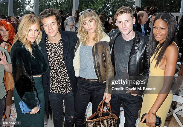 Sienna Miller, Harry Styles, Suki Waterhouse, George Barnett and Naomie Harris attend the front row at Burberry Prorsum Womenswear Spring/Summer 2014...