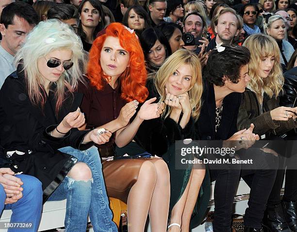 Alison Mosshart, Paloma Faith, Sienna Miller, Harry Styles and Suki Waterhouse attend the front row at Burberry Prorsum Womenswear Spring/Summer 2014...