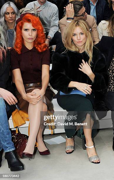 Paloma Faith and Sienna Miller attend the front row at Burberry Prorsum Womenswear Spring/Summer 2014 show during London Fashion Week at Kensington...