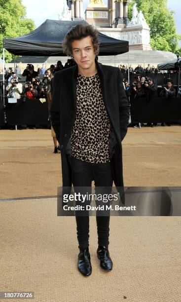 Harry Styles arrives at Burberry Prorsum Womenswear Spring/Summer 2014 show during London Fashion Week at Kensington Gardens on September 16, 2013 in...