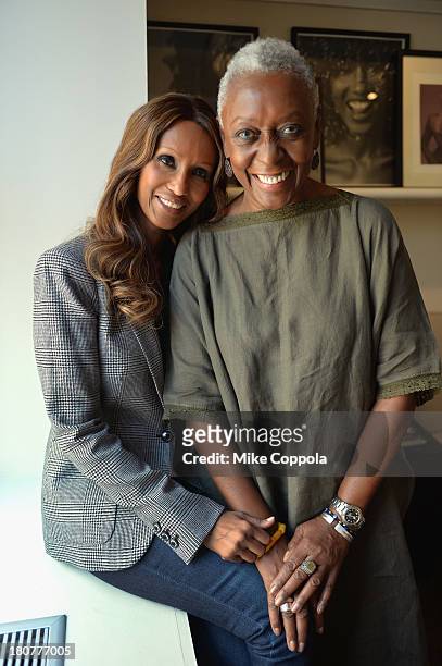 Models Bethann Hardison and Iman pose for a picture on September 12, 2013 at IMAN Cosmetics in New York City. Hardison is the head of the Diversity...