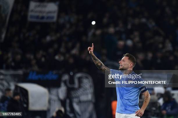 Lazio's Italian forward Ciro Immobile celebrates after scoring the team's second goal during the UEFA Champions League Group E football match between...