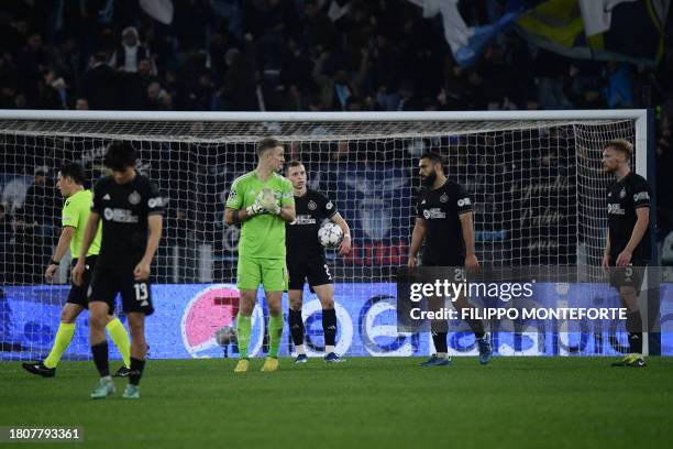 Celtic players react after Lazio's second goal during the UEFA Champions League Group E football match between Lazio and Celtic Glasgow at the...