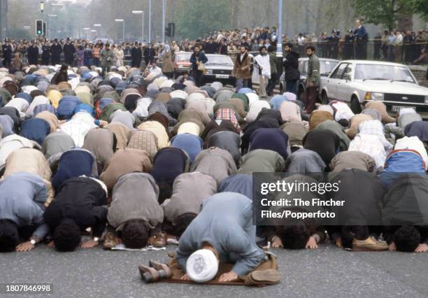 Iranians praying during the siege of the Iranian Embassy on Prince's Gate, South Kensington, London, circa May 1980.