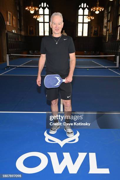 John McEnroe poses at the debut of the new OWL Pickleball Paddle on November 21, 2023 in New York City.