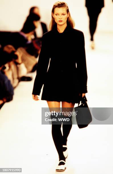 Model Kate Moss walks in the CK Calvin Klein Fall 1994 Ready to Wear Runway Show on April 10 in New York City.