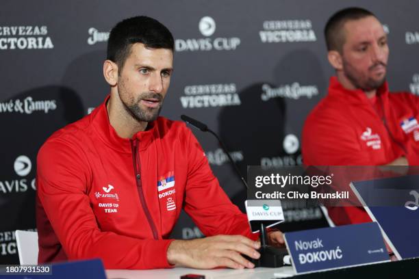 Novak Djokovic of Serbia speaks to the media in a press conference prior to the Davis Cup Finals at Palacio de Deportes Jose Maria Martin Carpena on...