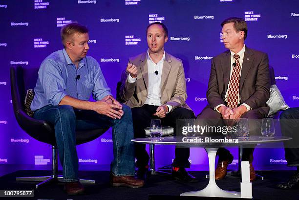 Alex Hawkinson, chief executive officer of SmartThings, from left, Jason Johnson, chairman of Internet of Things Consortium and founder and chief...