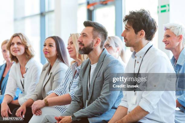 group of business people at conference - meeting attendees stock pictures, royalty-free photos & images