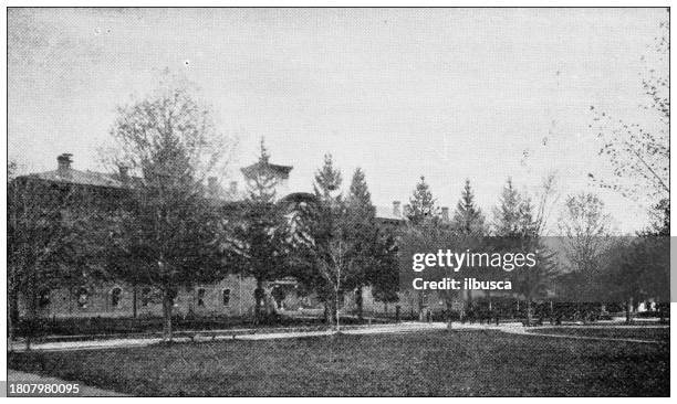 antique image of hampden county, massachusetts: rich hall, wesleyan academy, wilbraham - methodist stock illustrations