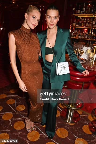 Poppy Delevingne and Arizona Muse attend the Mrs Alice x Della Vite cocktail party hosted by Poppy Delevingne and Alice Naylor-Leyland to celebrate...