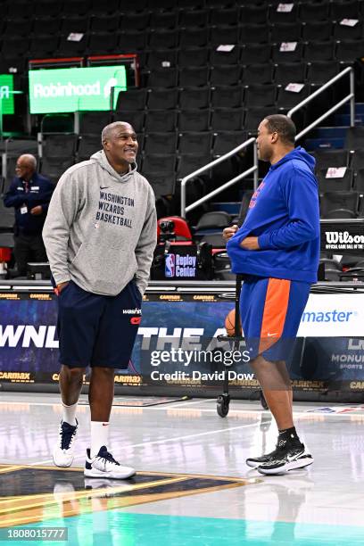 Assistant Coach James Posey of the Washington Wizards & Assistant Coach Othella Harrington of the New York Knicks looks on before the game on...