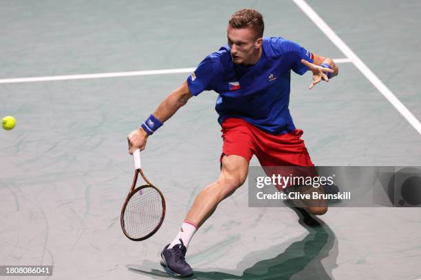 Jiri Lehecka of Czechia plays a backhand slice in the Davis Cup Quarter Final match against Alex De Minaur of Australia at Palacio de Deportes Jose...