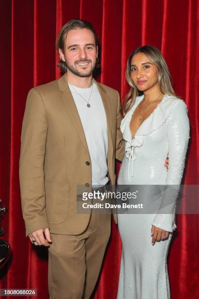 Alex Watson and Eshita Kabra-Davies attend a party to celebrate the 4th birthday of fashion rental app By Rotation at Geode on November 28, 2023 in...