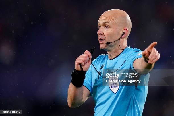 Referee Anthony Taylor points with finger during the Group E - UEFA Champions League 2023/24 match between Feyenoord and Atletico Madrid at the...