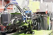 Photo of industrial plastic injection molding machine