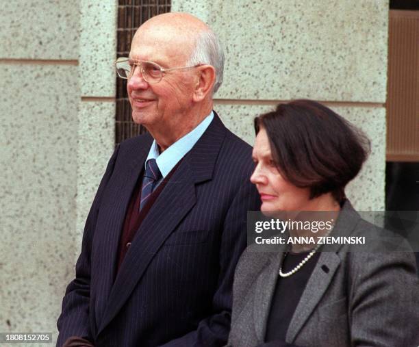 Former apartheid-era State President P W Botha and his wife, Barbara, leave the magistrate's court in George 17 August, after closing arguments by...