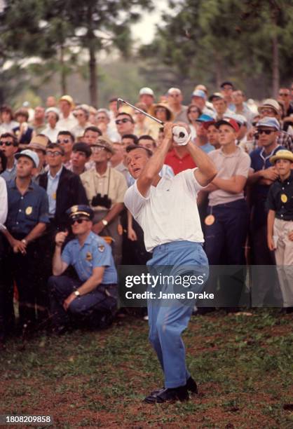 Arnold Palmer plays a shot during the first round of the 1965 Masters Tournament at Augusta National Golf Club in April 08, 1965 in Augusta, Georgia.