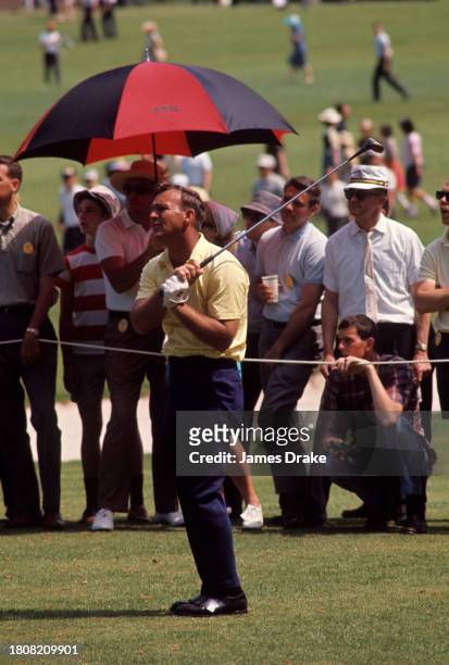 Arnold Palmer plays a shot during the second round of the 1965 Masters Tournament at Augusta National Golf Club in April 09, 1965 in Augusta, Georgia.
