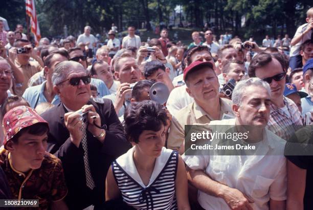 Fans watch the National Baseball Hall of Fame Induction Ceremony at the National Naseball Hall of Fame Library on July 25, 1966 in Cooperstown, New...