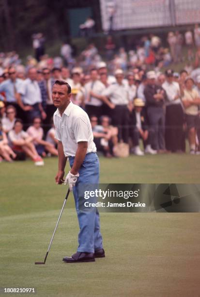 Arnold Palmer plays a shot during the first round of the 1965 Masters Tournament at Augusta National Golf Club in April 08, 1965 in Augusta, Georgia.