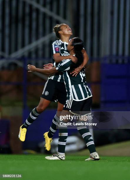 Nikita Parris of Manchester United celebrates with Jayde Riviere of Manchester United after scoring the team's first goal during the FA Women's...