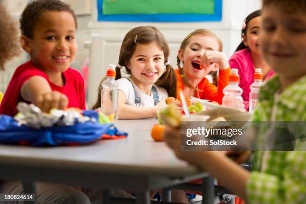 young students at lunchtime - boy packlunch stockfoto's en -beelden