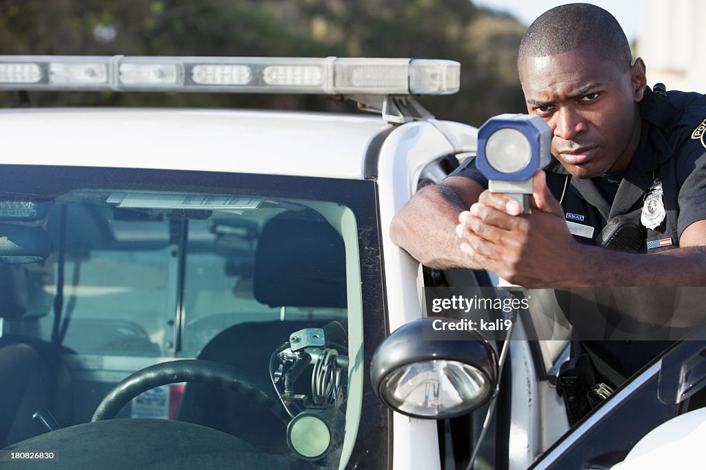 Police officer with radar gun