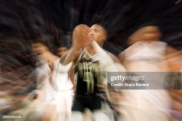 Damian Lillard of the Milwaukee Bucks shoots a free throw during a game against the Dallas Mavericks at Fiserv Forum on November 18, 2023 in...