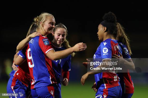 Araya Dennis of Crystal Palace celebrates with teammates after scoring the team's second goal during the FA Women's Continental Tyres League Cup...