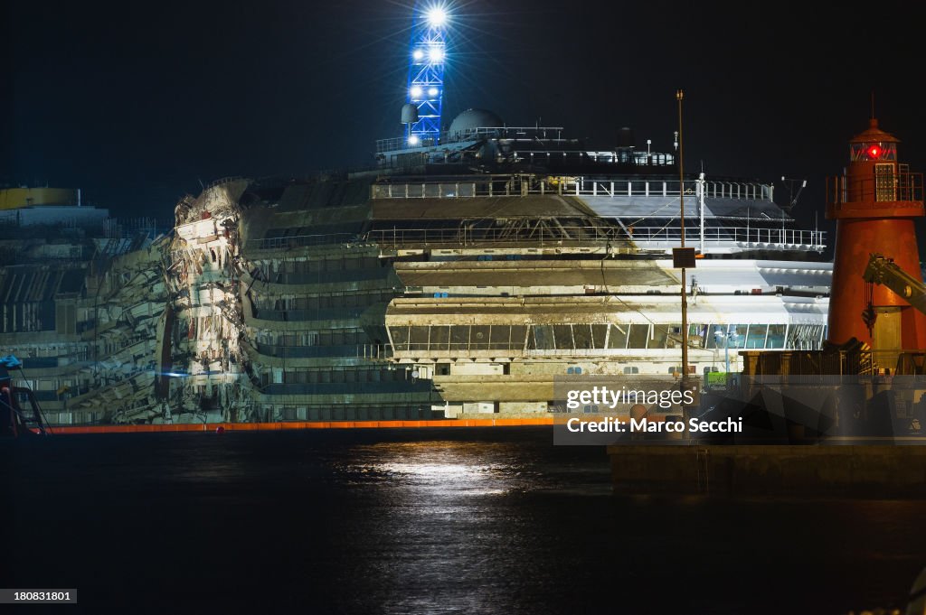 Engineers Attempt To Raise The Costa Concordia Cruise Ship After It Sank In 2012