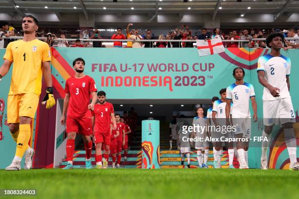 England and IR Iran players walk in prior to the FIFA U-17 World Cup Group C match between England and IR Iran at Jakarta International Stadium on...