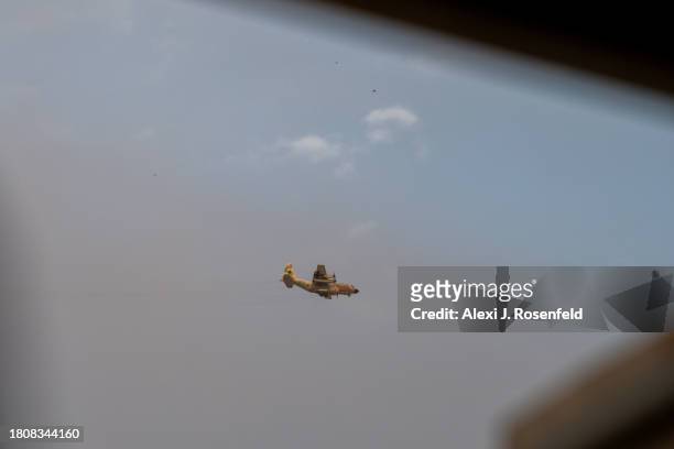 An Israeli Air Force plane is seen flying on November 22, 2023 in Southern Israel. More than a month after Hamas's Oct. 7 attacks, the country's...