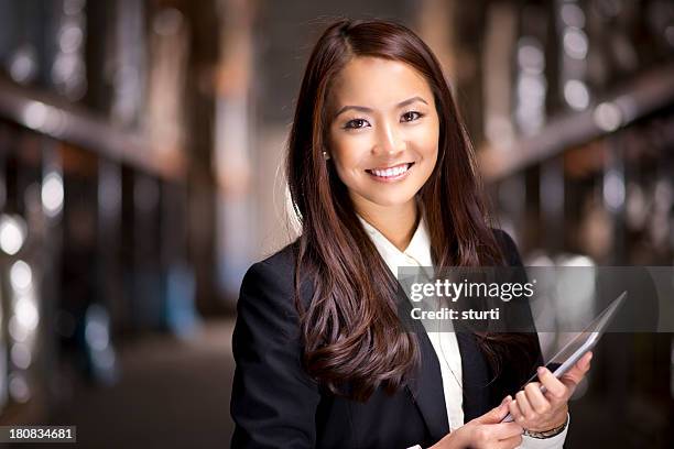 warehouse manager - asian business women stock pictures, royalty-free photos & images