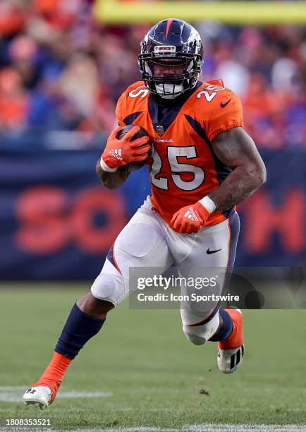 Denver Broncos running back Samaje Perine finds a nice hole to run during an NFL game between the Cleveland Browns and the Denver Broncos on November...