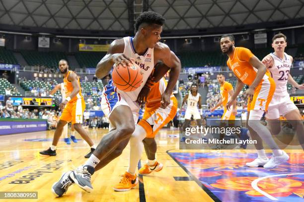 Adams Jr. #24 of the Kansas Jayhawks drives to the basket in the second half of a college basketball game against the Tennessee Volunteers during a...