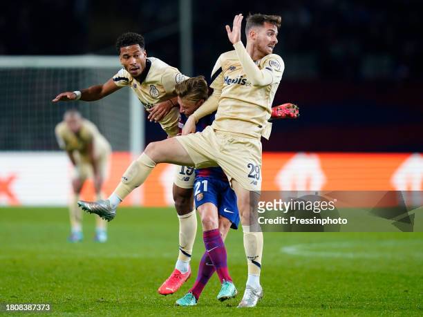 Frenkie de Jong of FC Barcelona and Toni Martinez and Danny Namaso of FC Porto during the UEFA Champions League match, Group H, between FC Barcelona...